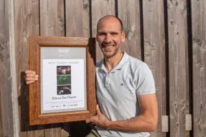 Stefan van Beek met Award